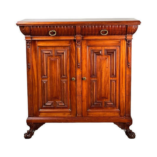 Antique English Jacobean Revival Mahogany Buffet (c. 1915–1925) featuring ornate carvings, two drawers with brass rings, two paneled doors with brass knobs, and four clawed feet. Brand: Unknown.