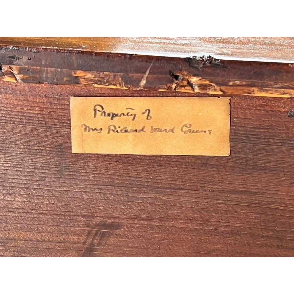 A handwritten label reading "Property of Mrs. Richard Israel Green" is affixed to the dark wood of an Antique Sheraton Mahogany Bowfront Chest, c. Early 19th Century, with the label slightly worn on its surface.