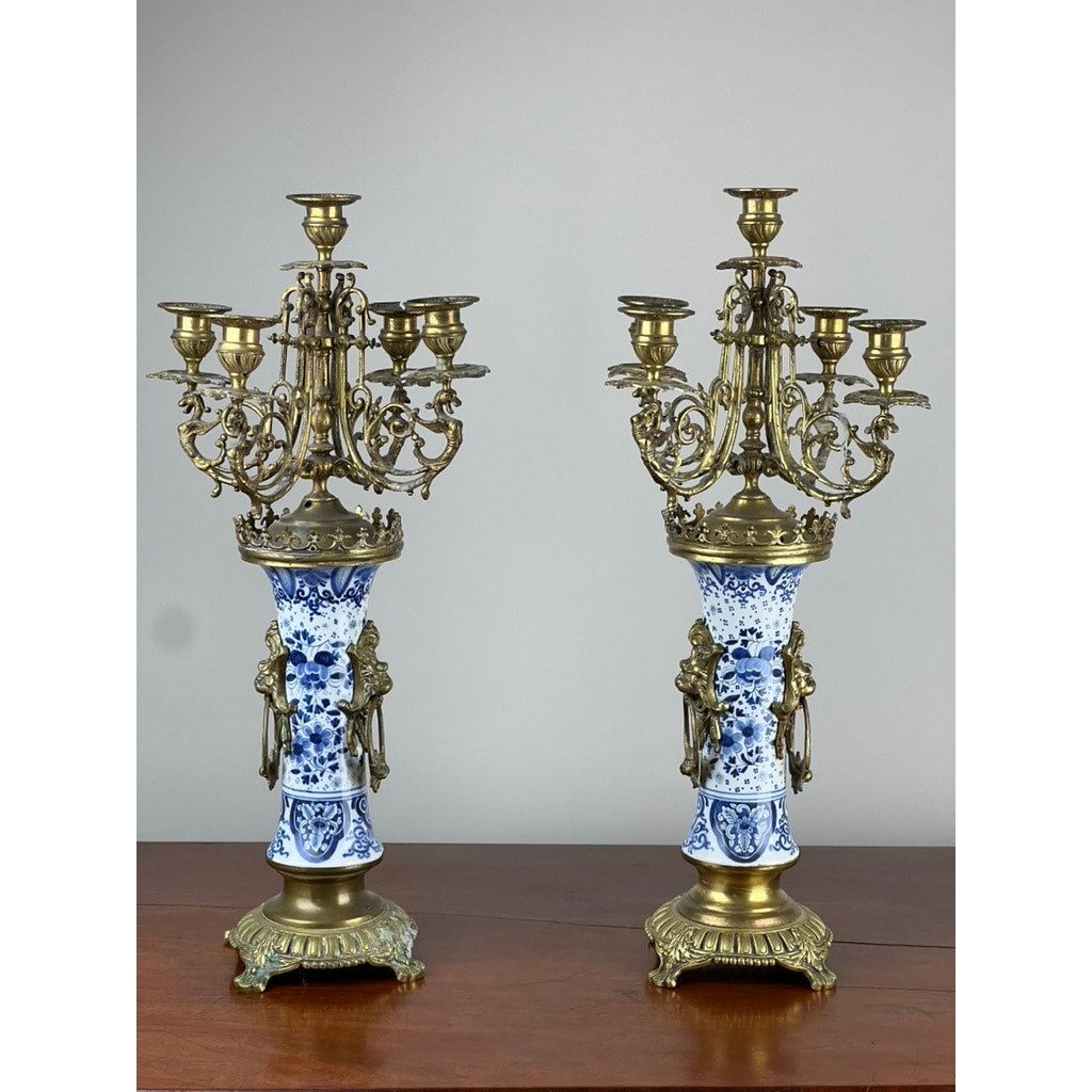 Matched pair of antique Delft porcelain and bronze five-light candelabra