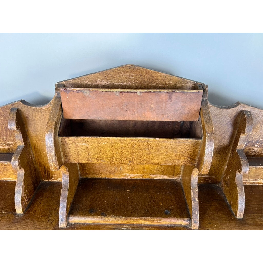 A close-up of an Antique Victorian Country Grain Painted Jelly Cupboard c. 1870 shows multiple compartments, an angled top, and a rich brown finish. The piece has a rustic, aged look reminiscent of vintage country furniture and appears empty.