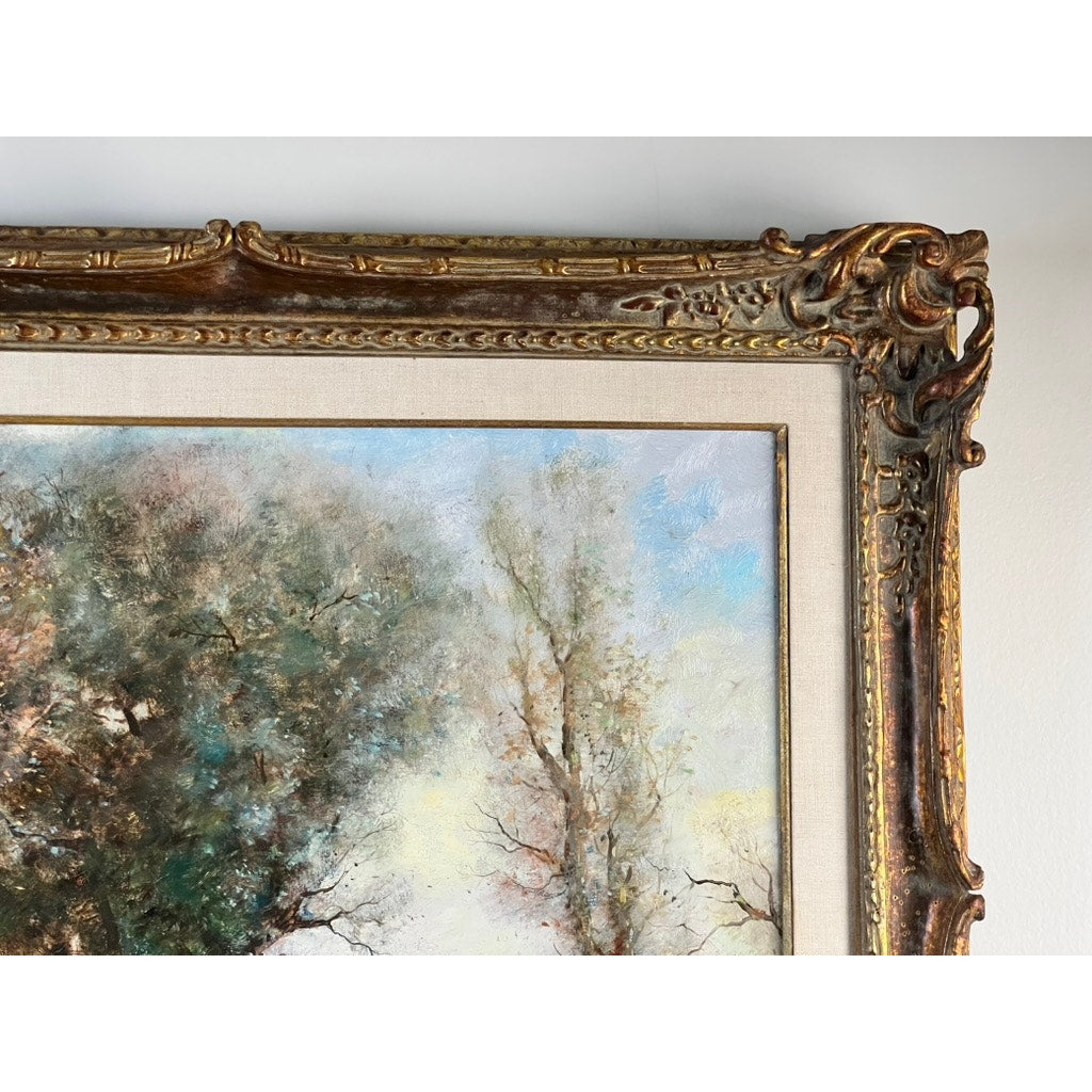 Close-up of the ornate top right corner of a gilded, decorative frame holding the "Vintage Guy Cambier Belgian Romantic Landscape Oil Painting with Horsemen, c. 1960–1980," featuring intricate carvings and a gold finish. Brand: None/Unknown.