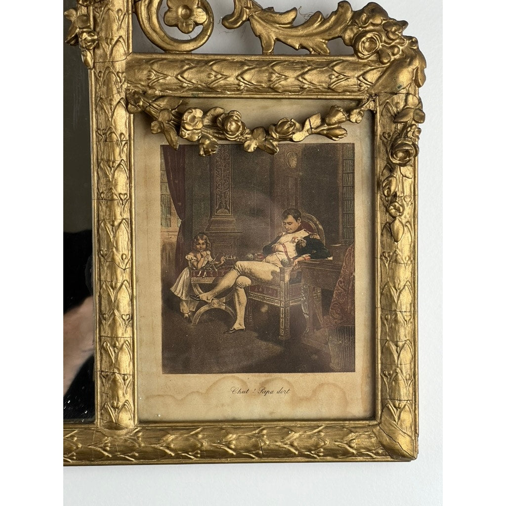 An Exceptional Antique Louis XV Style Three Panel Mirror, artist unknown, is flanked by images of Napoleon in a richly detailed setting.