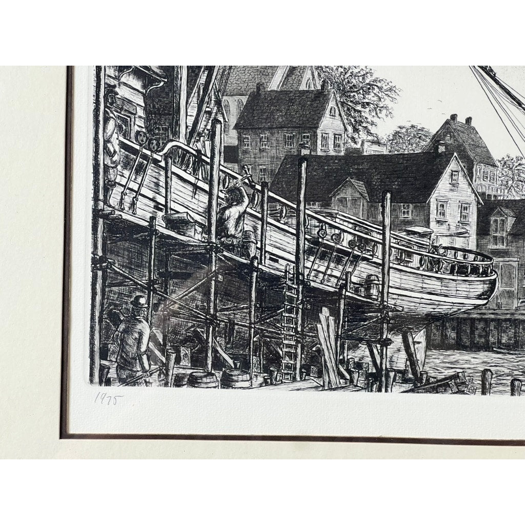Framed Etching “The Schooner” by Alan Jay Gaines—black-and-white scene of workers repairing a wooden boat on scaffolding before old houses, with ladders and barrels. Number 1975 in the border. Classic maritime art.