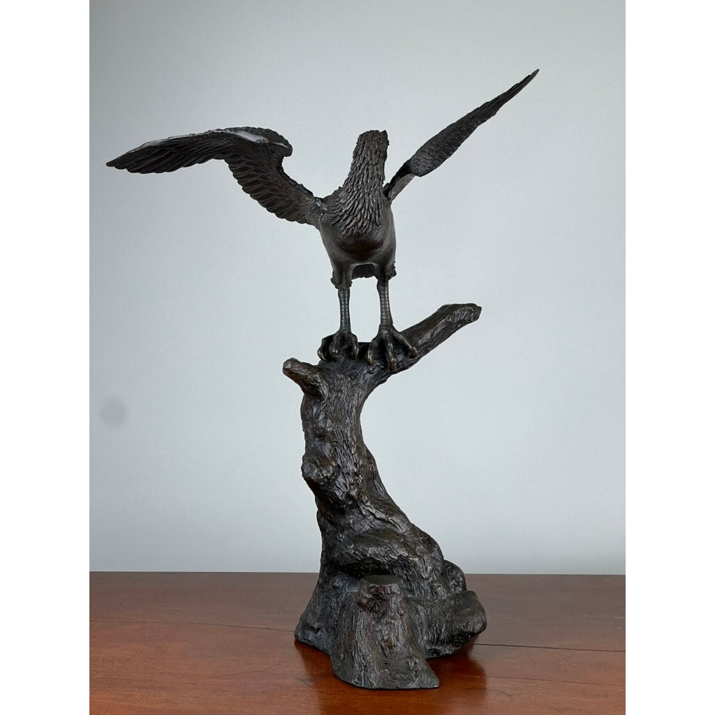 Japanese Meiji bronze hawk sculpture with outstretched wings, one wing slightly loose