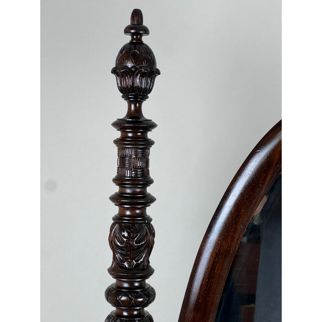 A detailed view of an Impressive Antique American Empire Acanthus and Barbola Rose Carved Cheval Mirror c. 1840 displays ornate floral and geometric carvings on dark wood, reflecting 19th-century craftsmanship against a neutral background.