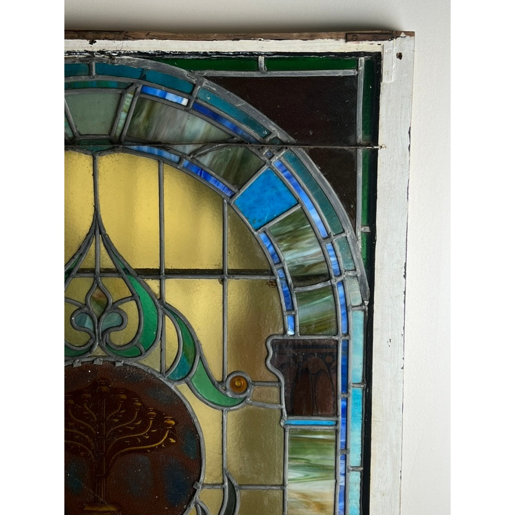 Stained glass window with tree motif medallion from Temple Beth El