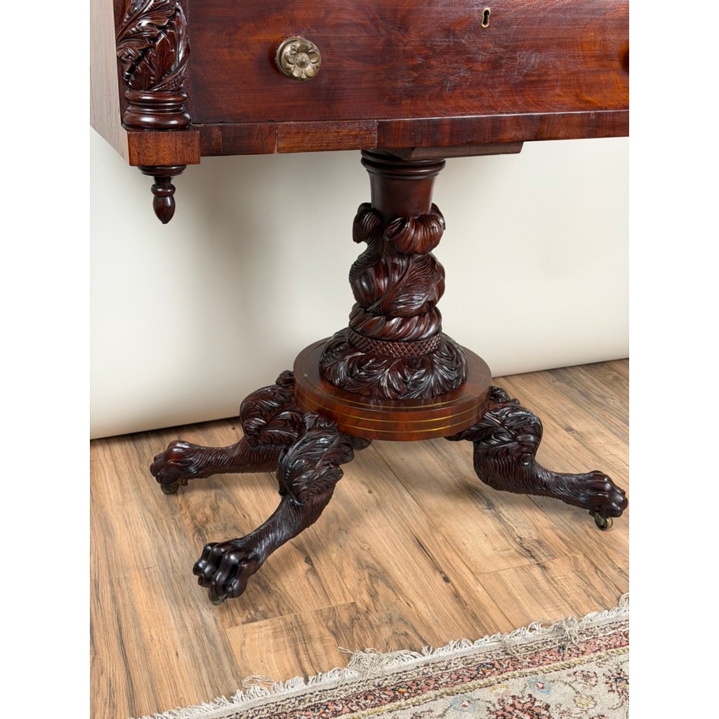 American Classical Carved Mahogany Dressing Table with Original Mirror, featuring a central pedestal base with ornate leaf motifs and four carved animal-paw feet on casters.