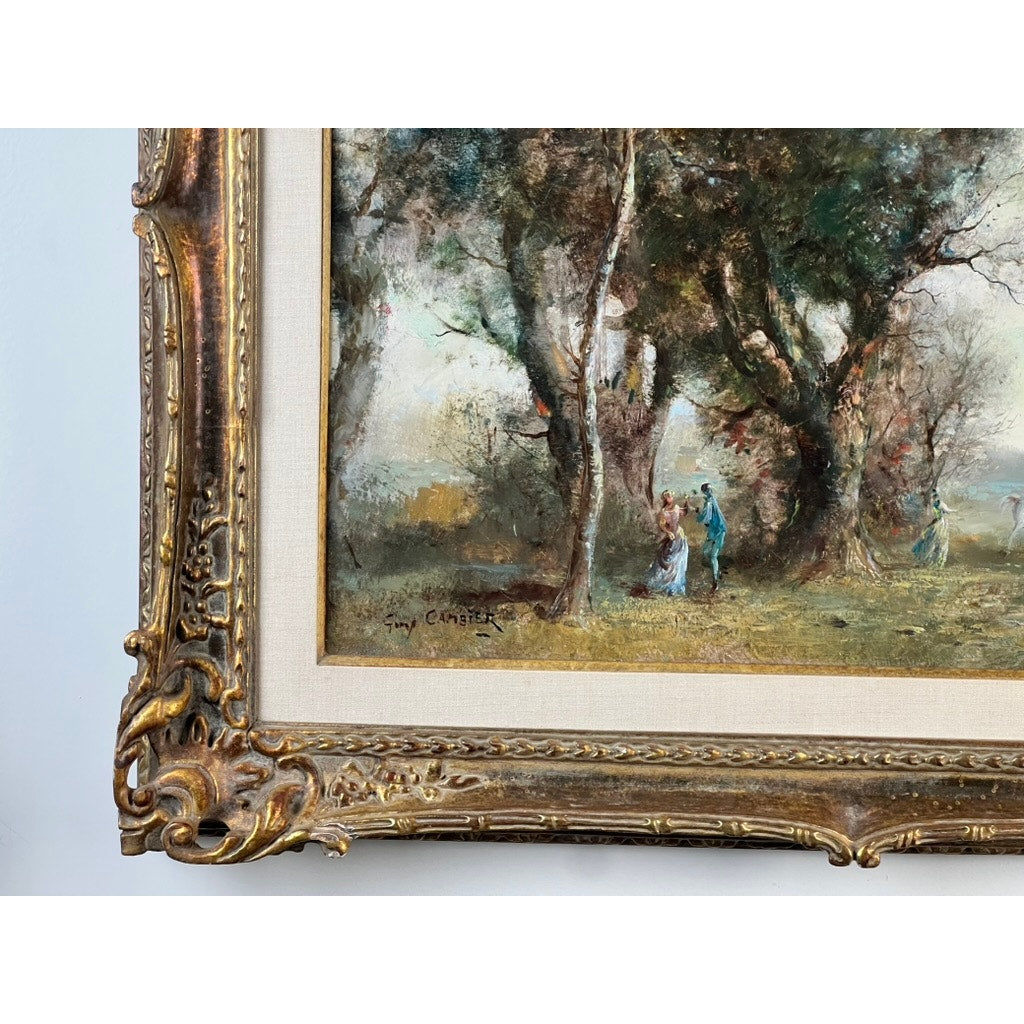 Close-up of a Vintage Guy Cambier Belgian Romantic Landscape Oil Painting (c. 1960–1980) featuring horsemen near forest trees, set in an ornate gold-colored frame with intricate designs; artist's signature in bottom left corner.