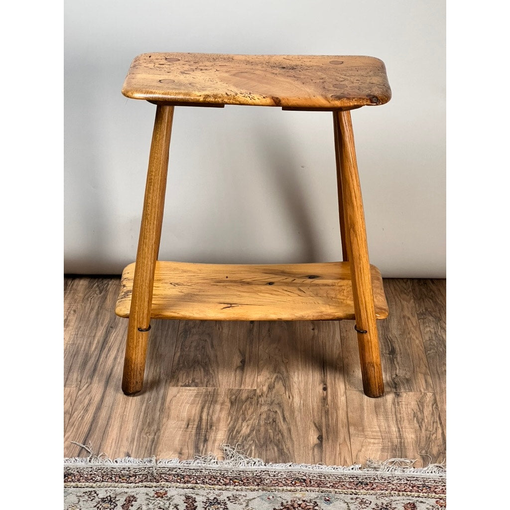 A handcrafted Vintage Wabi Sabi Bench from spalted maple, signed by Neil Panyik, features a natural wood grain finish and rustic character, shown on a wood floor near a patterned rug. Brand: None or unknown.