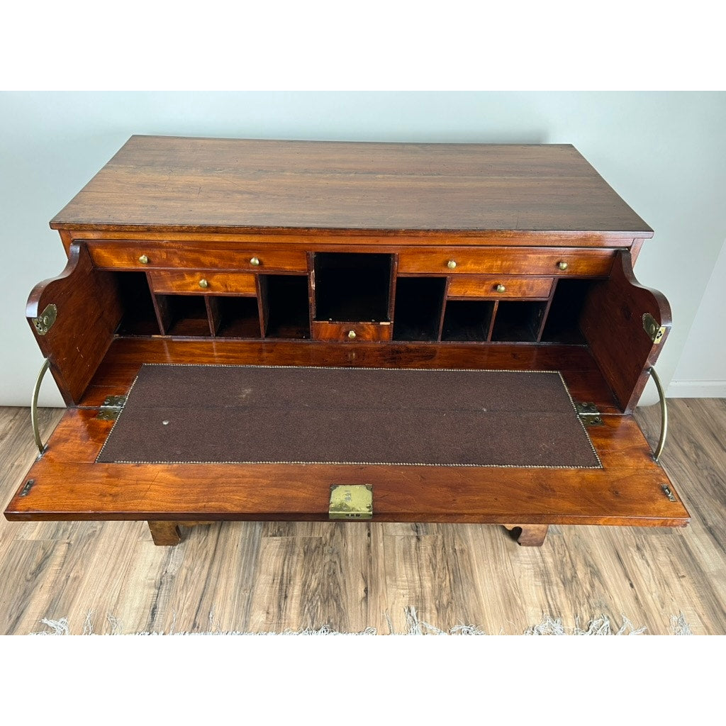 The Antique George IV Butlers Secretary, c. early 19th century, features an open front with small compartments, drawers, brass handles, and a felt writing surface—an elegant example of classic English Regency design. Brand: Unknown.