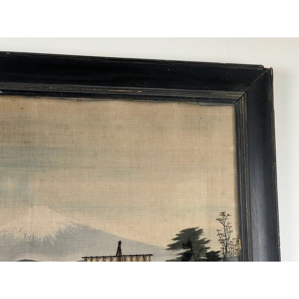 Close-up of the upper left corner of a Japanese Meiji Period Embroidered Painting attributed to Nishimura Sozaemon of Kyoto, showing a mountain, trees, part of a structure, and a black wooden frame with visible grain and slight wear.