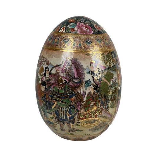 The Large Antique Satsuma Porcelain Egg Chinese Export features intricate Japanese artwork with samurai, women in traditional dress, and floral gold accents—a collectible inspired by classic Satsuma porcelain egg designs.