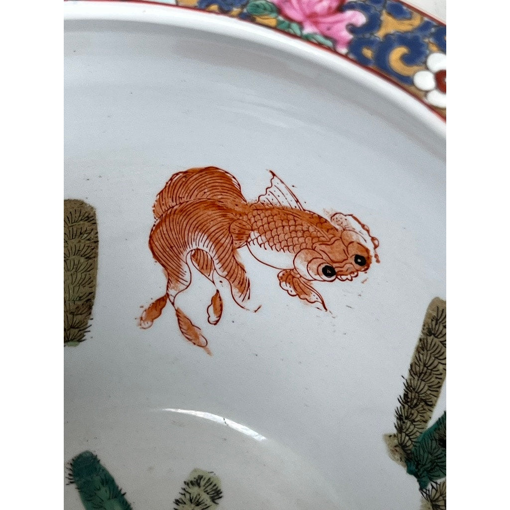 Close-up of a Vintage Chinese Famille Rose Fish Bowl Signed Minicucci featuring a detailed orange fish, green plants, and a colorful floral patterned rim with cobalt blue gilt accents. Brand: Unknown.