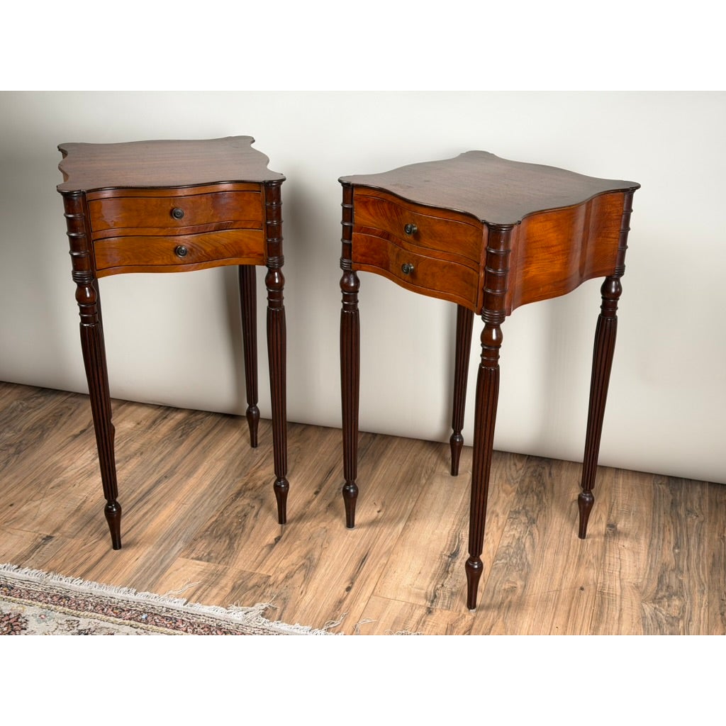 Pair of American Classical Revival Mahogany Two-Drawer Work Tables, circa 1880–1910, featuring two drawers, wavy edges, and tapered legs.