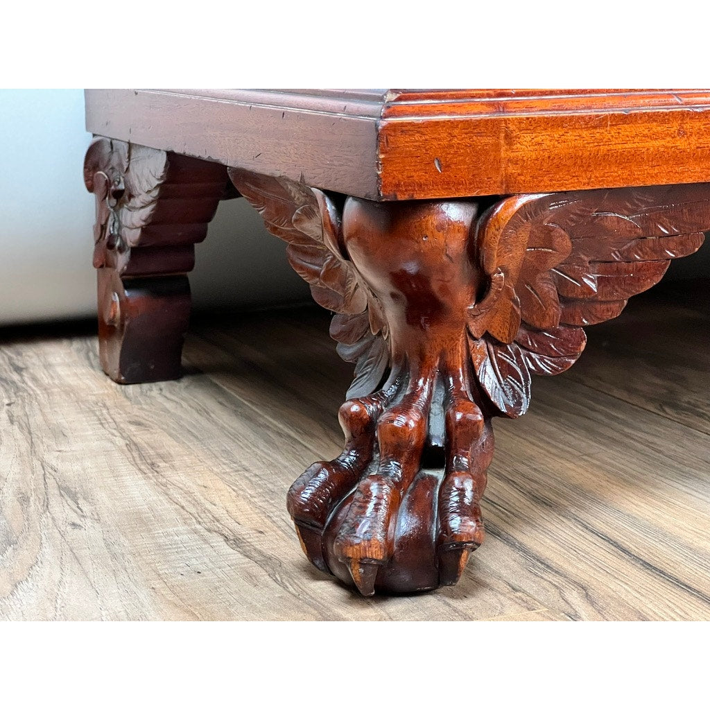 Close-up of an Antique English Jacobean Revival Mahogany Buffet c. 1915–1925, showing its carved eagle’s claw foot with detailed feathers, supporting the polished buffet on a hardwood floor. Brand: None/Unknown.