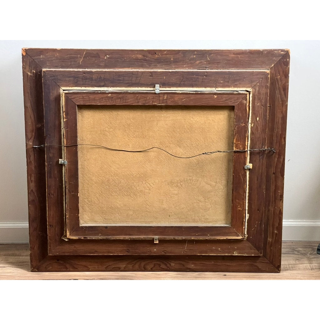 The image shows the back of an antique early 20th-century oil on canvas painting, “Spectacle Bridge,” signed Arthur Davis lower left, in a rectangular wooden frame with metal hanging wire and clips, resting on a wooden floor against a white wall.
