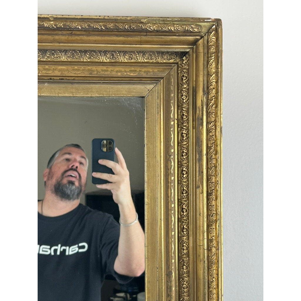 A bearded man in a black Carhartt shirt takes a selfie in a Fine Antique 19th Century Gilt Wood Mirror (39 x 34), partially covering his face with his phone; only part of his face and upper body are visible.