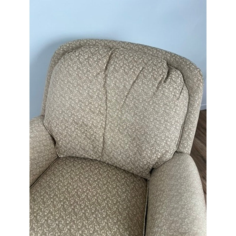 Jessica Charles rocking chair and ottoman in patterned neutral fabric