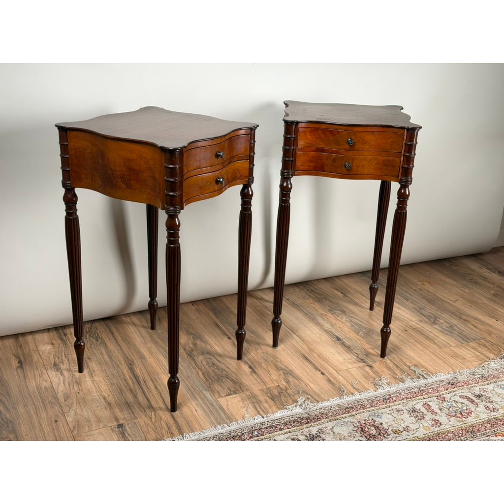 Pair of American Classical Revival Mahogany Two-Drawer Work Tables, circa 1880–1910, each featuring two drawers and four slender, fluted legs.