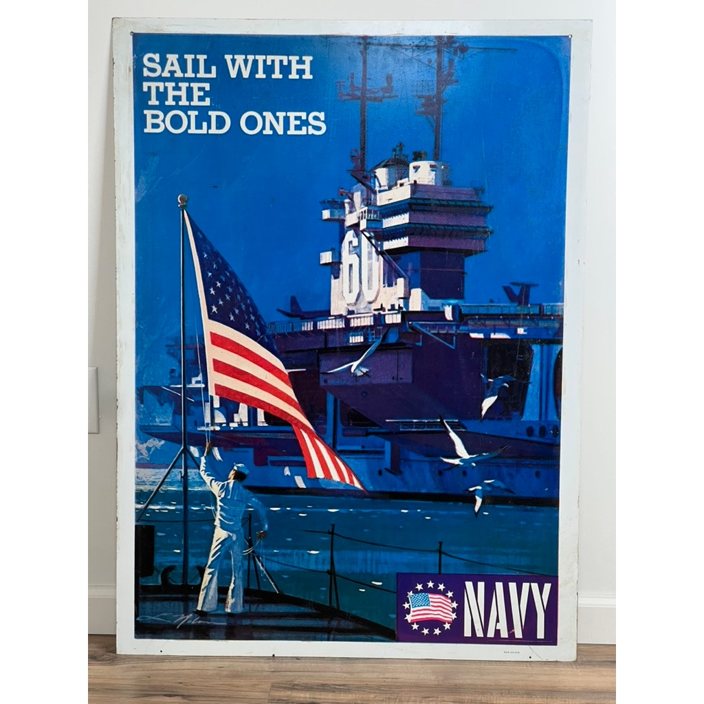 This original Vietnam Era double-sided U.S. Navy recruiting tin sign by artist Lou Nolan features the USS Saratoga and classic patriotic imagery with the text: SAIL WITH THE BOLD ONES and NAVY.