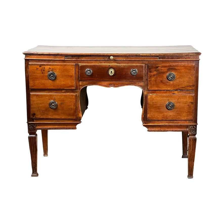 Antique Louis XVI period ladies desk, c. 18th century, with five drawers, round metal handles, carved legs, tooled leather top, polished worn wood finish. Center drawer has a keyhole and open space below. Brand unknown.