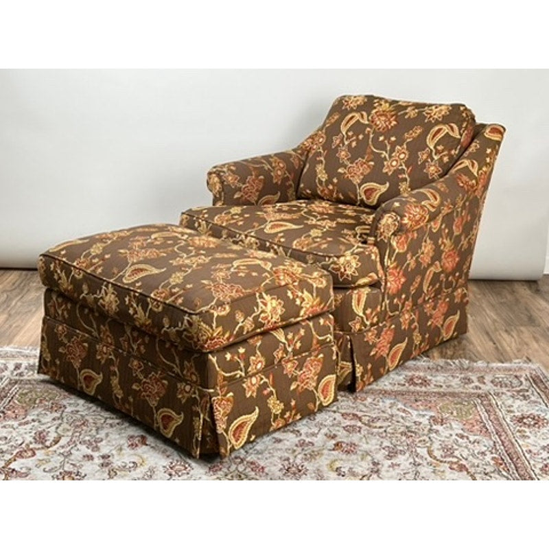 Vintage upholstered club chair with ottoman in floral paisley fabric