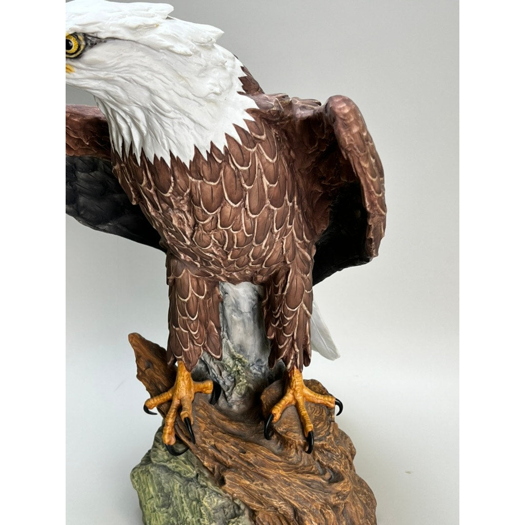 The Rare Kaiser Porcelain American Bald Eagle Sculpture Limited Edition No. 12/200, by Kaiser (W. Germany), features a detailed brown and white eagle with yellow beak and sharp talons perched on a rocky base.