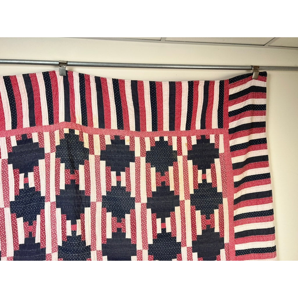 A matching pair of antique American patriotic hand-quilted Log Cabin quilts (early 20th century) features blue and red geometric blocks with red, white, and blue stripes, evoking the charm of vintage Americana. Brand: None/Unknown.