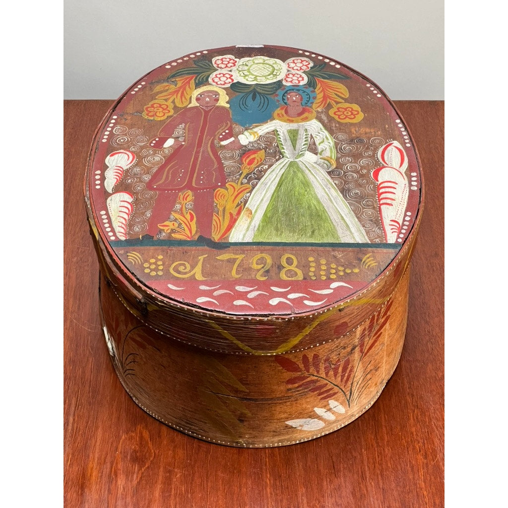 Antique Swedish Polychrome Painted Marriage Box dated 1798—an oval bentwood box with a colorful folk-style lid showing a man and woman in traditional dress, floral motifs, and the painted date 1798; a fine example of Scandinavian folk art.