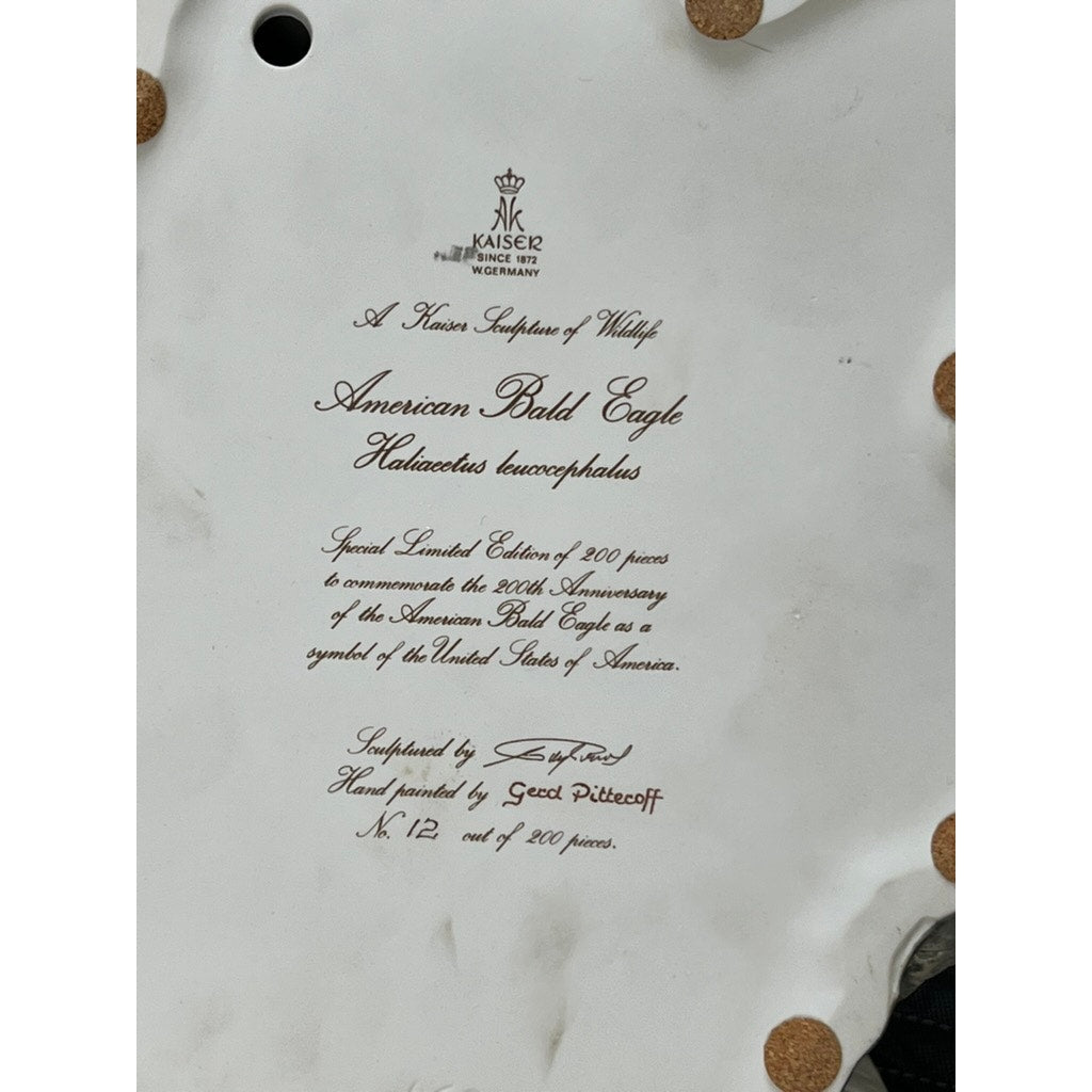 The Rare Kaiser Porcelain American Bald Eagle Sculpture Limited Edition No. 12/200, W. Germany, features the edition number handwritten and the artist’s signature on the back, highlighting its exclusivity as one of only 200 made by Kaiser.