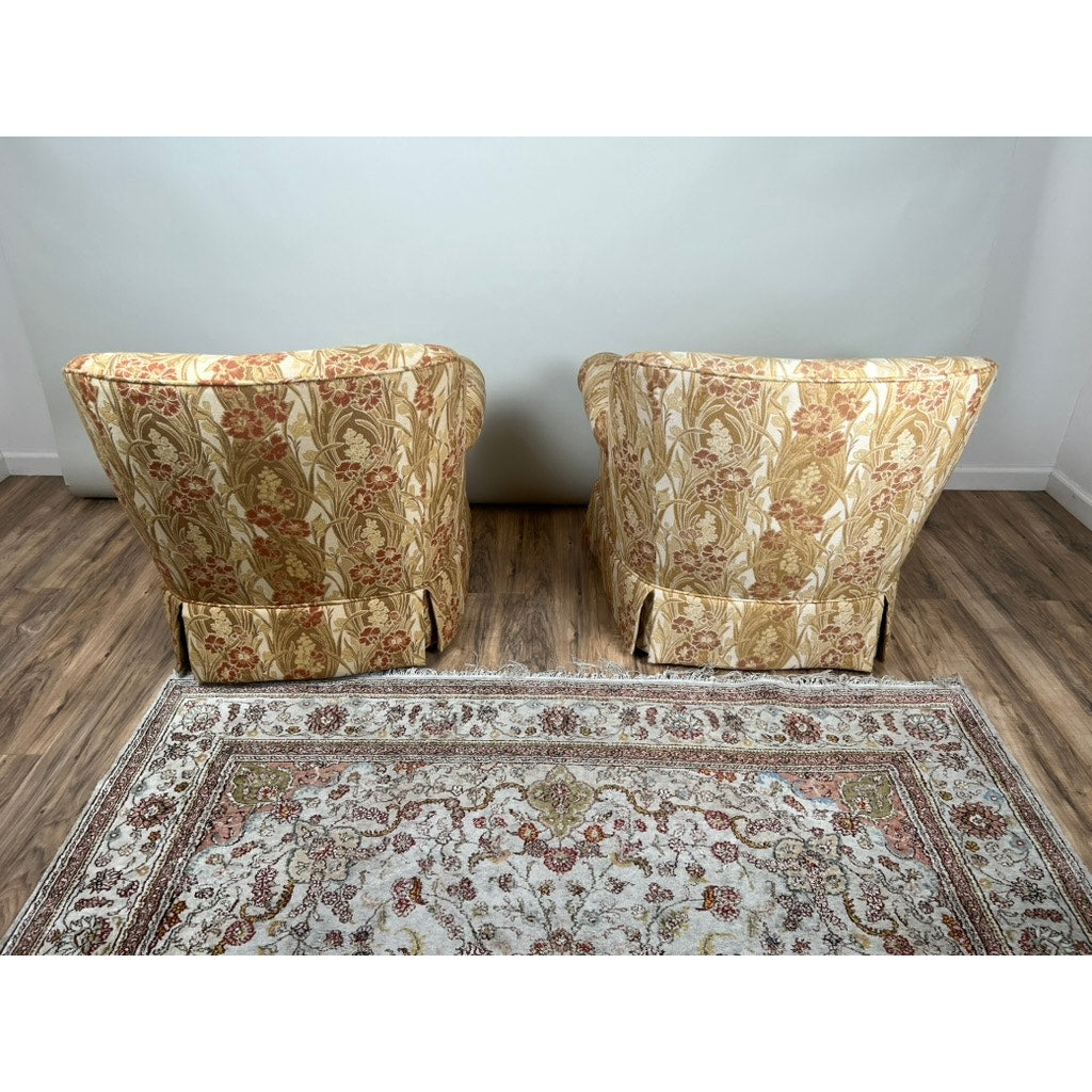 Pair of vintage upholstered club chairs in floral fabric