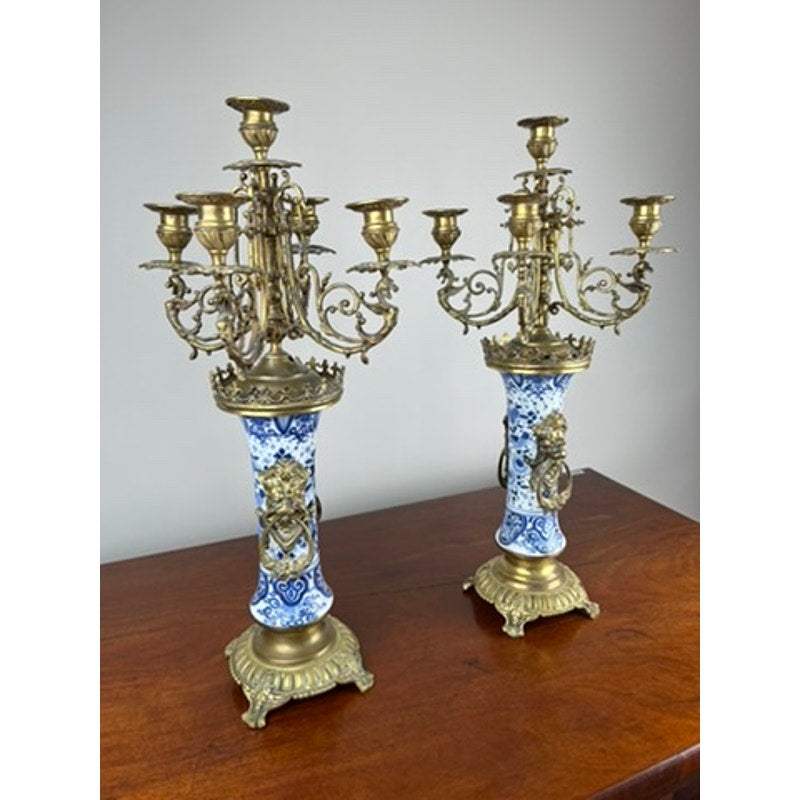 Boch Dutch Delft porcelain and gilt bronze candelabra with lion masks