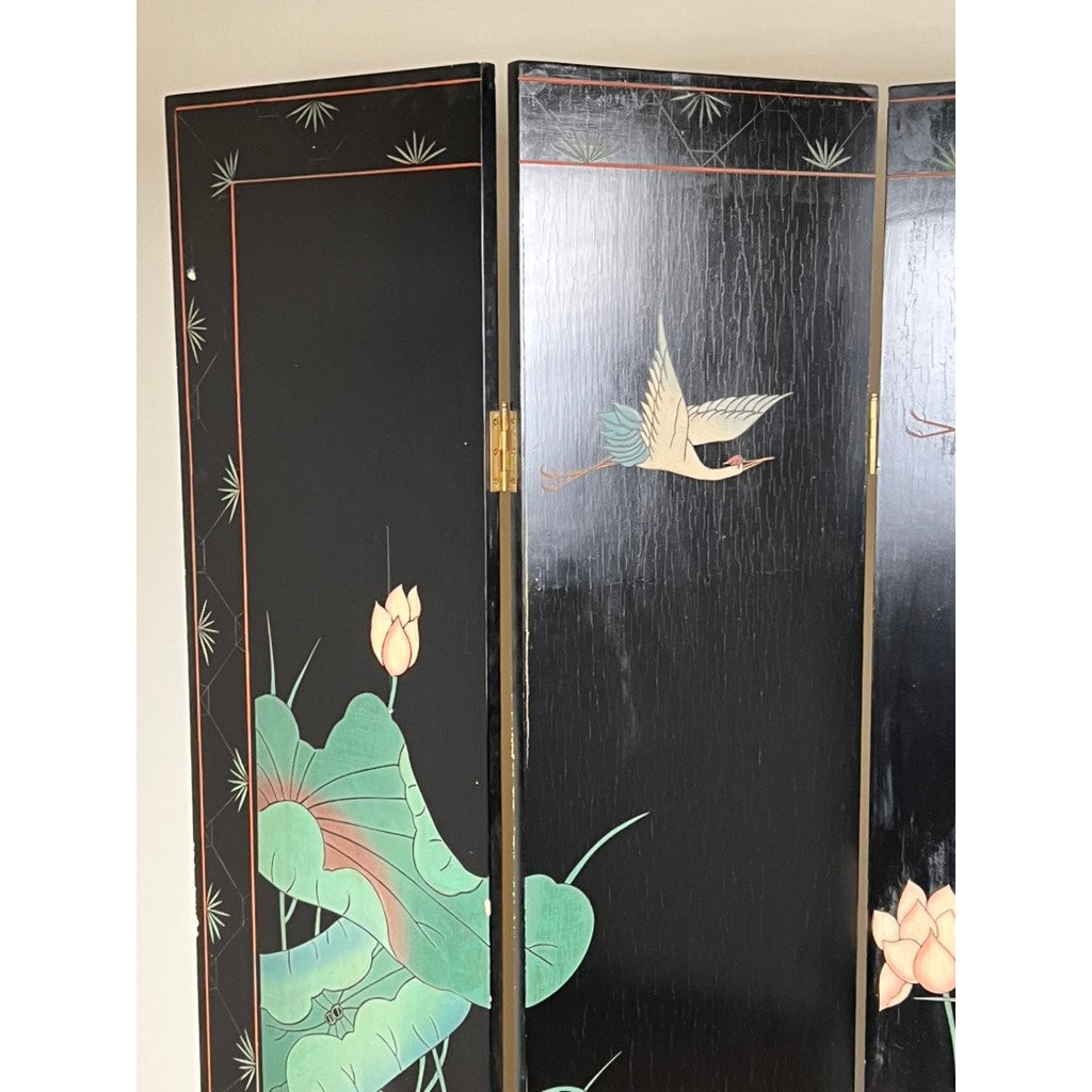 The Vintage Asian Black Lacquer Coromandel Room Screen features a black background, painted lotus flowers, green leaves, and a flying crane. Its panels are connected by brass hinges. Brand is unknown.