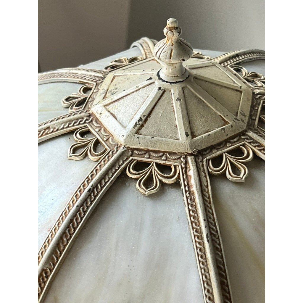 Close-up of an ornate Vintage Art Nouveau Slag Glass Two-Light Table Lamp (c. 1935–1955) with intricate raised patterns, gold accents, and a decorative finial, ideal for adding timeless charm as unique decorative lighting. Brand unknown.