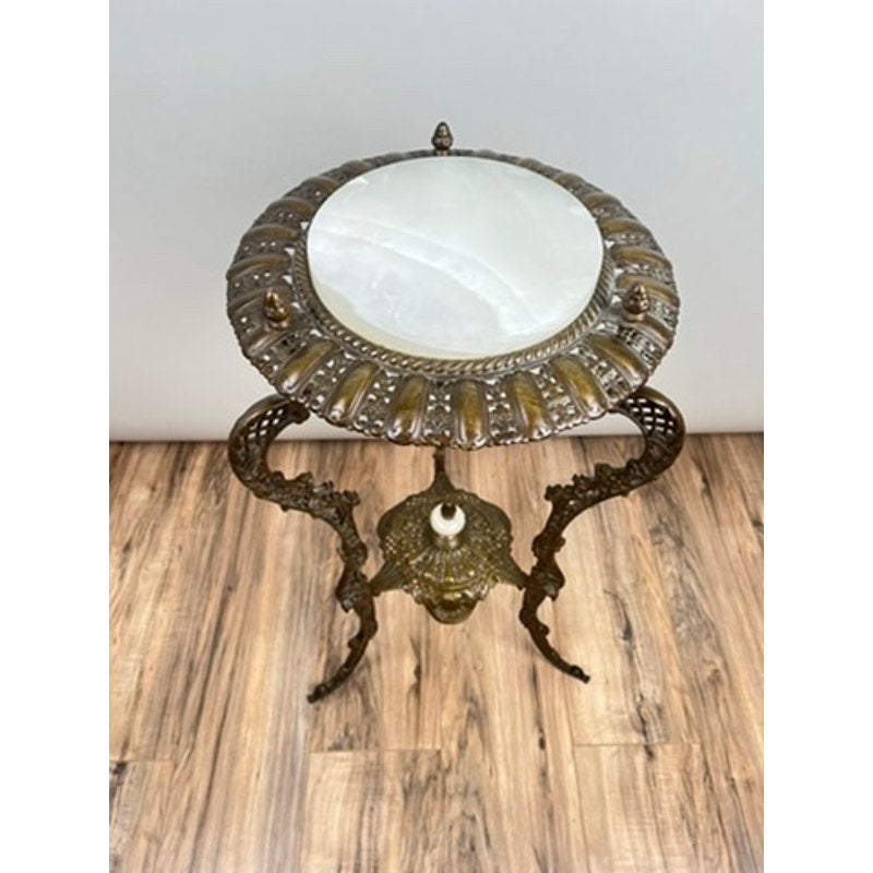 Antique Victorian Bronze and Onyx Stand, late 19th century, with intricate bronze metalwork and a round white onyx top, displayed on a wooden floor against a plain backdrop. Brand: Unknown.