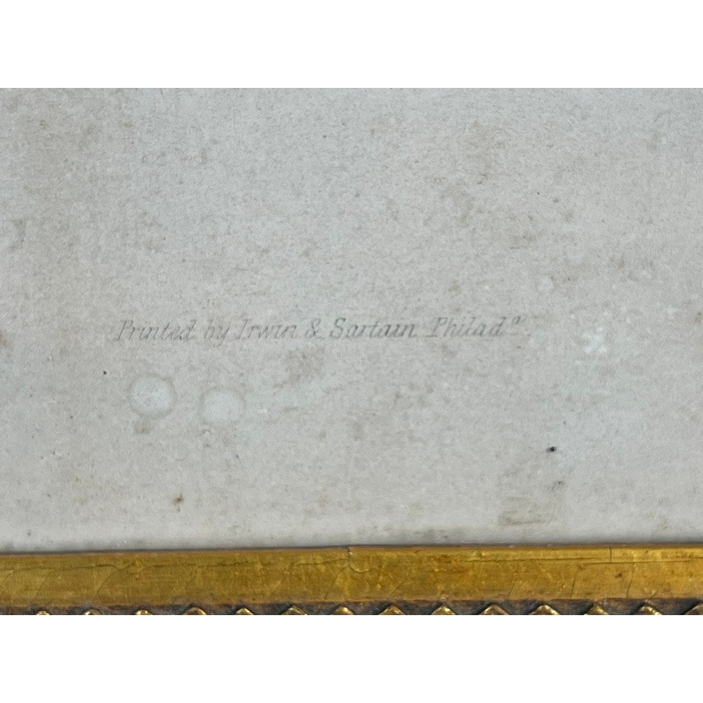 Faded text on a light, speckled background reads “Published by Bradley & Co., Philadelphia, 1858,” highlighting the historic craftsmanship behind the Antique “Washington and His Family” Engraving. A gold-edged frame is visible at the bottom of the image, characteristic of this period gilt frame and evocative of patriotic 19th-century prints.