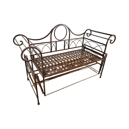 The Vintage Regency Style Wrought Iron Porch Glider features ornate scrollwork on the arms and back, a slatted seat, and an arched backrest with a circular detail. Perfect as garden patio furniture, it is shown isolated on a white background. Brand unknown.