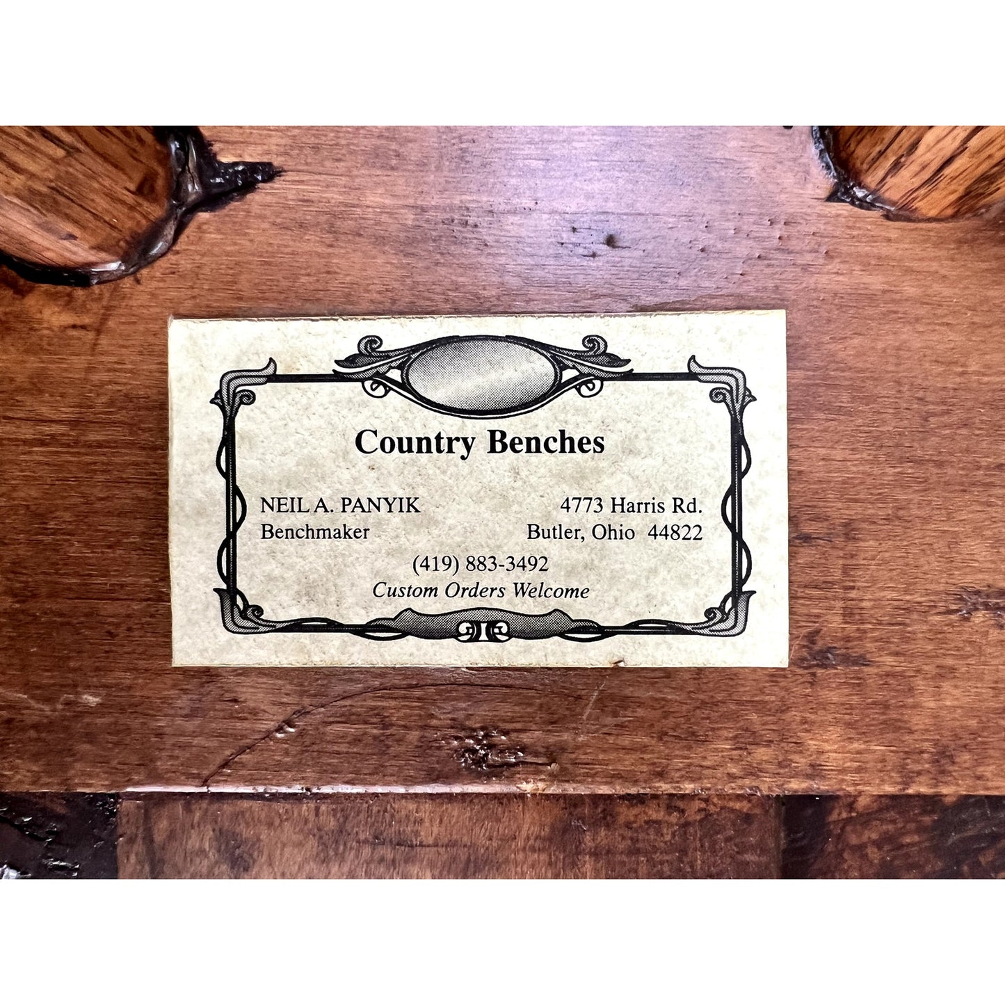 A business card for Neil A. Panyik in Butler, Ohio, maker of the Vintage Hand Made Oak Wabi Sabi Bench (signed), features contact info and "Custom Orders Welcome"—specializing in handmade oak and live edge bench designs.
