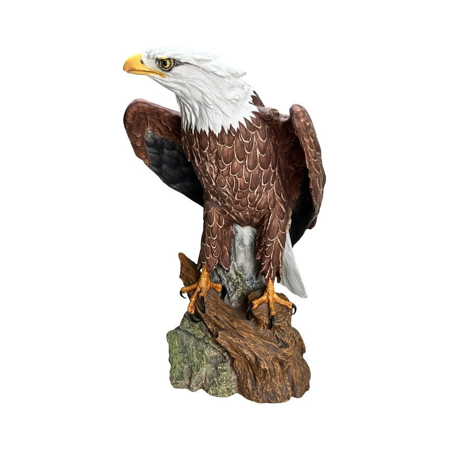 The Rare Kaiser Porcelain American Bald Eagle Sculpture Limited Edition No. 12/200 by Kaiser (W. Germany) features a white-headed, yellow-beaked eagle perched on a brown and green rock against a white background.