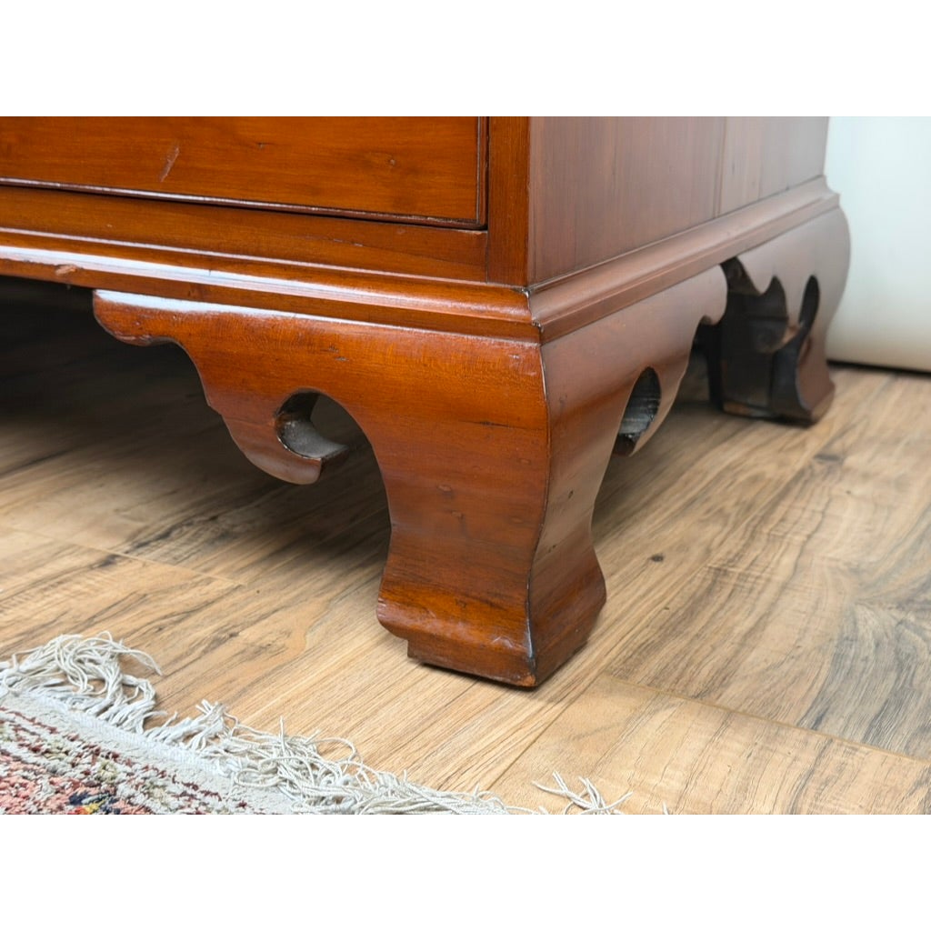 Close-up of the ogee bracket feet on a Chippendale Cherry Slant-Front Desk with Ogee Bracket Feet, Possibly Connecticut River Valley, circa 1770–1790.