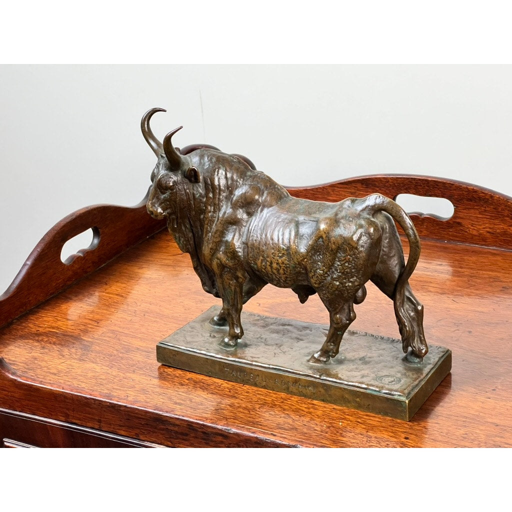 The Jean-Baptiste Clesinger “Taureau Romain” bronze sculpture, cast by the Barbedienne Foundry in Rome in 1858, depicts a bull with pronounced horns on a rectangular base and displays intricate musculature for striking realism.