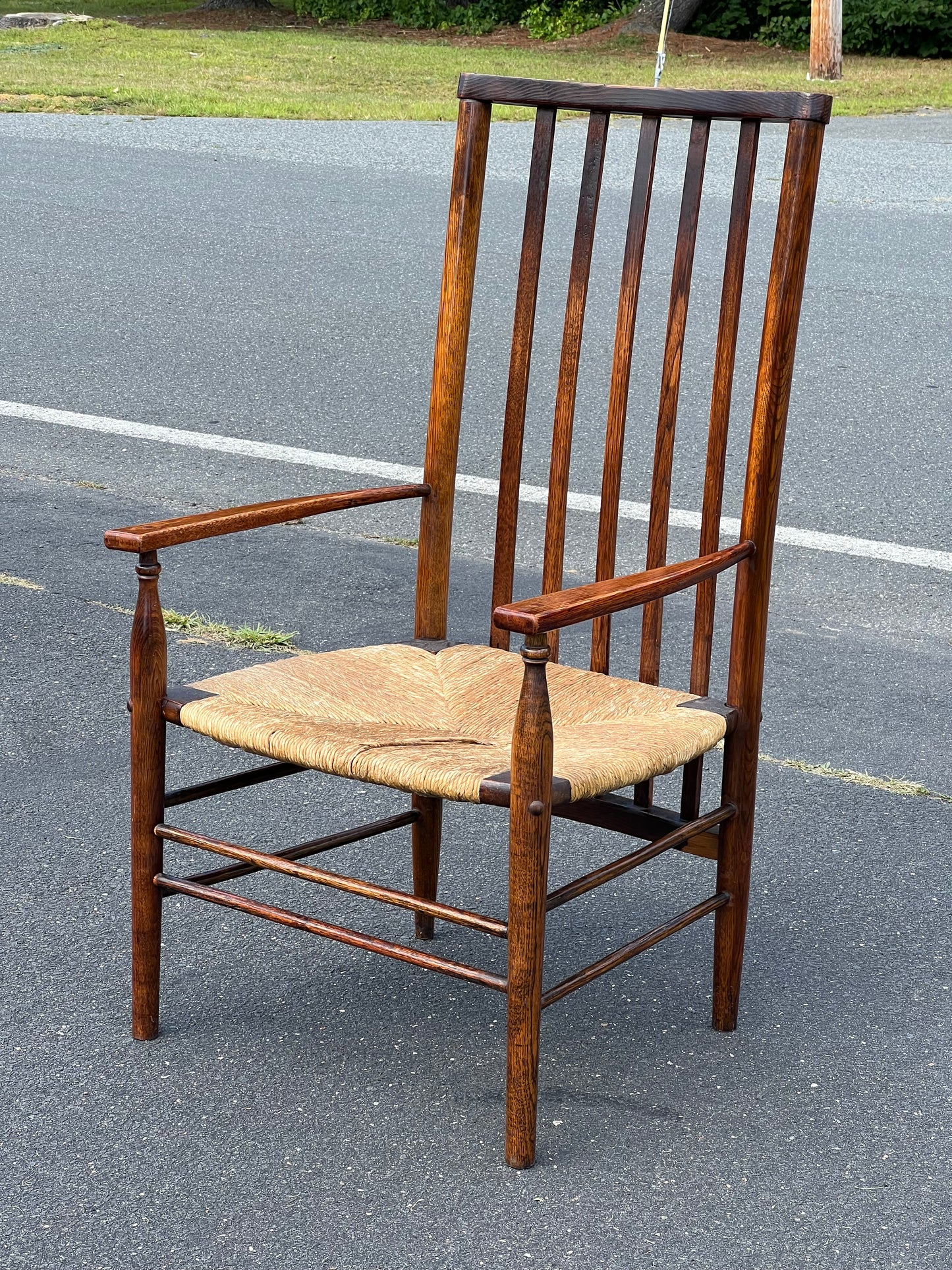 Antique Edwardian Oak Elbow Chair with Rush Seat c. 1910