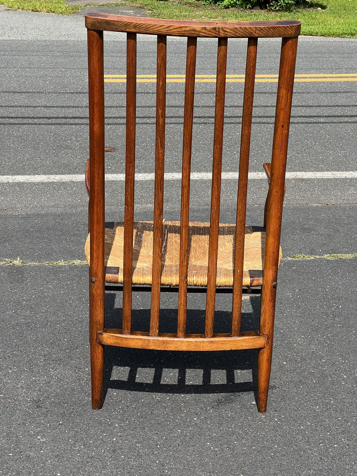 Antique Edwardian Oak Elbow Chair with Rush Seat c. 1910