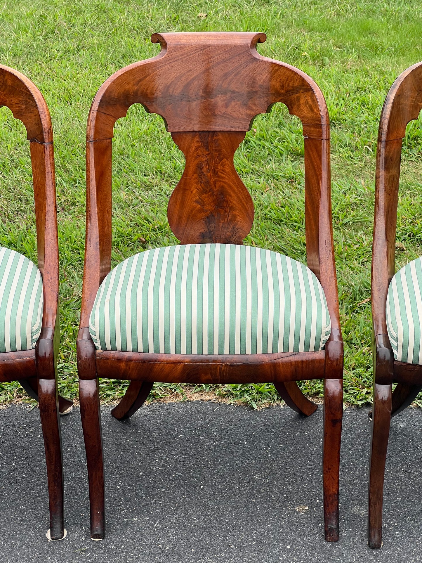 Antique Suite of Four Saber Leg Flame Mahogany Chairs c. 1830