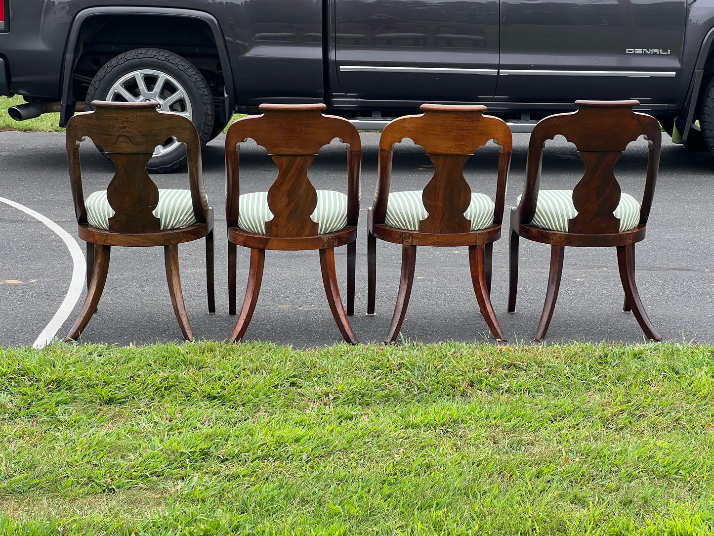 Antique Suite of Four Saber Leg Flame Mahogany Chairs c. 1830