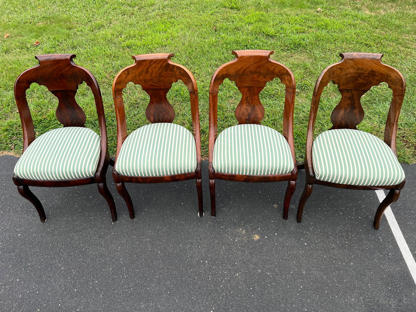 Antique Suite of Four Saber Leg Flame Mahogany Chairs c. 1830