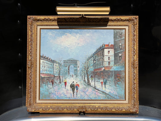 L’Arc de Triomphe Impressionist Paris Street Scene Oil on Canvas by listed artist Xavier Rabous, offered by Pearl City Antiques, depicts Parisians walking toward the Arc de Triomphe along classic city streets beneath a soft blue sky.