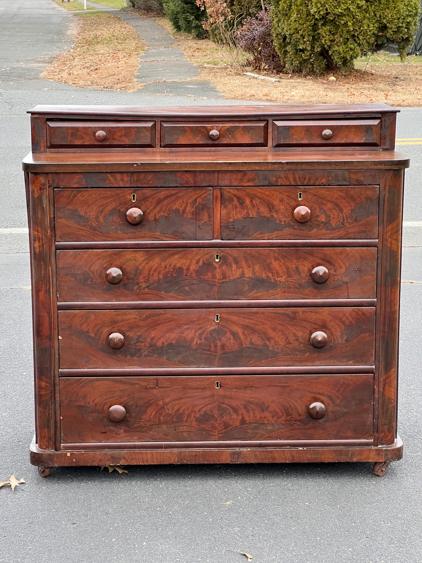 Antique American Empire Flame Mahogany Two Over Three Chest of Drawers from the 1830s