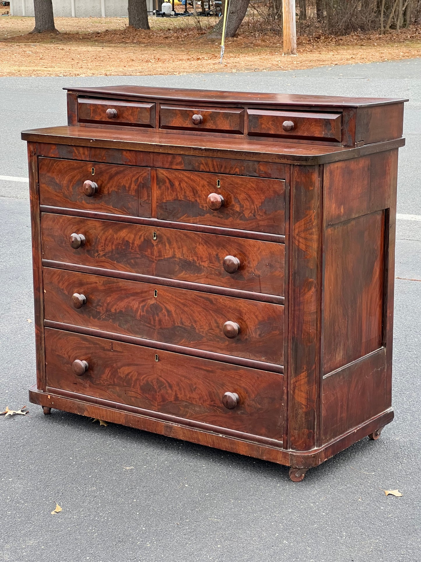 Antique American Empire Flame Mahogany Two Over Three Chest of Drawers from the 1830s