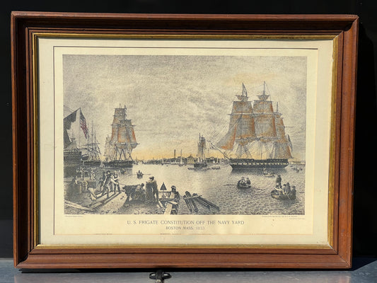 Pearl City Antiques' Framed Print features the U.S. Frigate Constitution off the Boston Navy Yard in 1833, with sailing ships, rowboats, and onlookers along the shore.